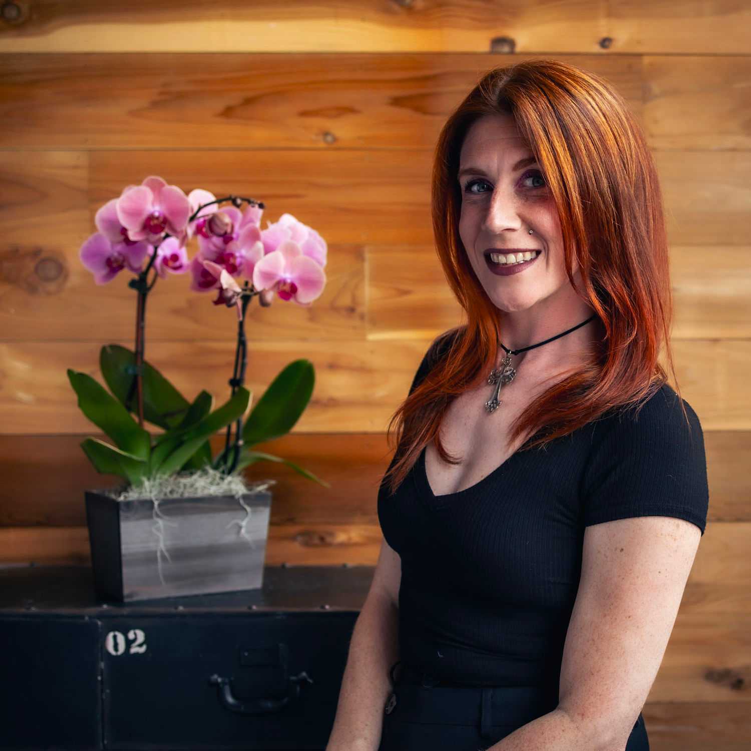Portrait of Lauren, a professional stylist at Salon Paul Michael, showcasing their expertise and style.