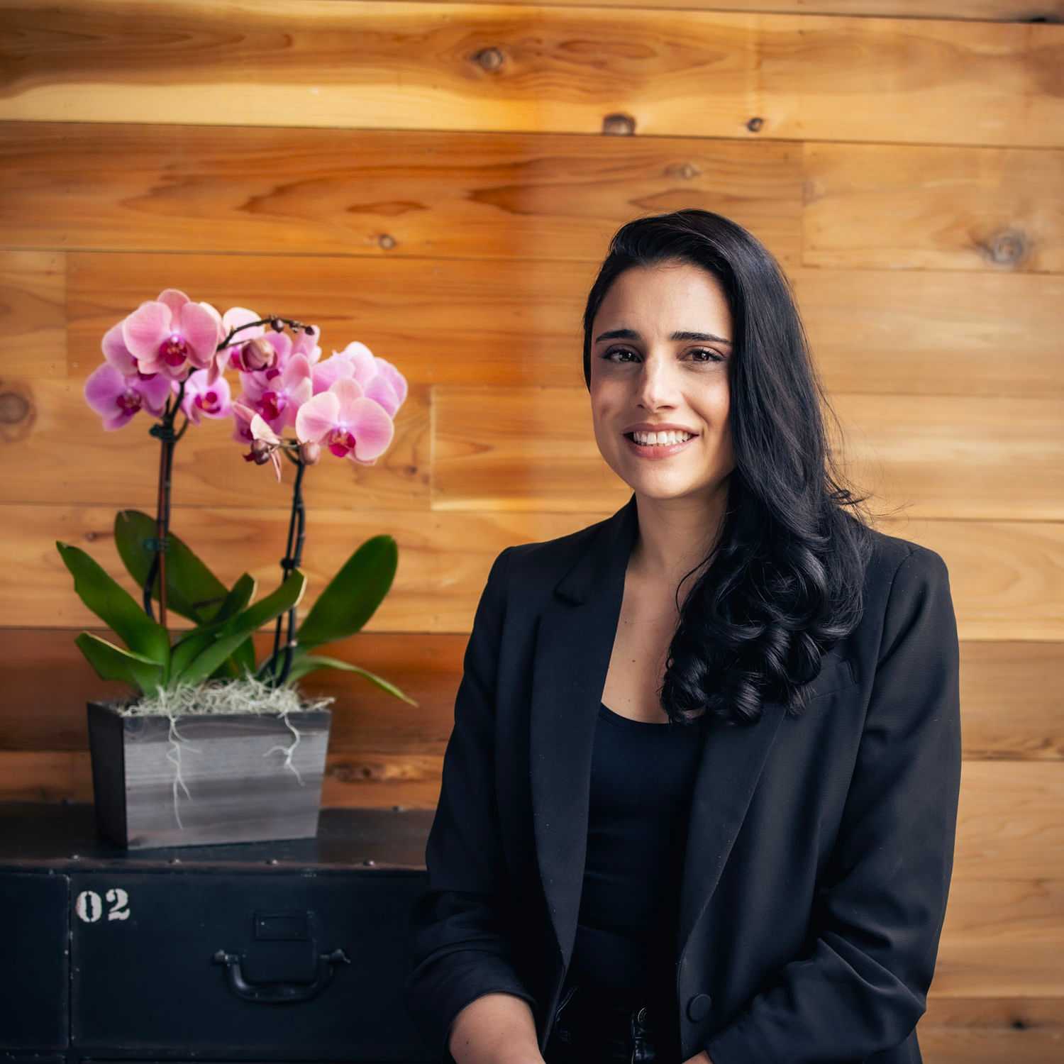 Portrait of Melissa, a professional stylist at Salon Paul Michael, showcasing their expertise and style.