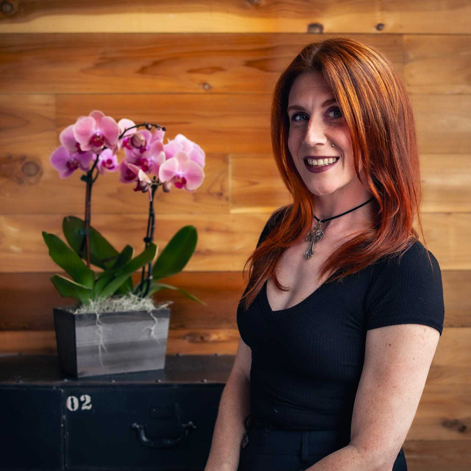 Portrait of Lauren, a professional stylist at Salon Paul Michael, showcasing their expertise and style.