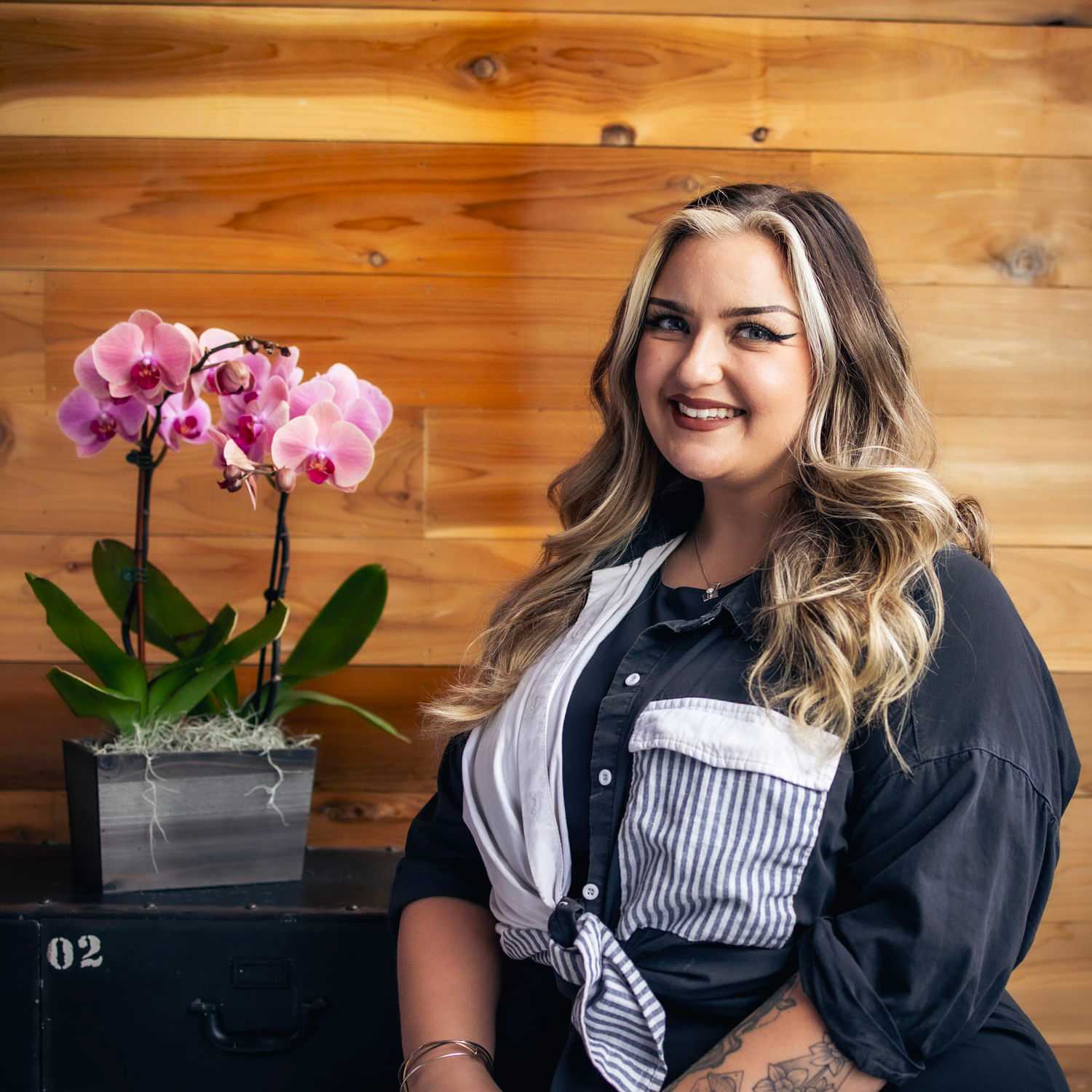 Portrait of Johanna, a professional stylist at Salon Paul Michael, showcasing their expertise and style.